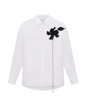 boutonniere on dress shirt Save this video so you never struggle to put on a boutonnire again!! , EXTRA TIPS TO KEEP IN MIND:, Make sure your florist gives you 2 pins! You could maybe get away with only having one for a